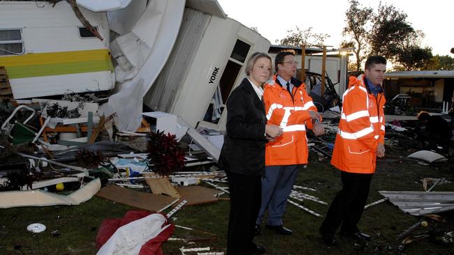 Premier of NSW, Kristina Keneally, SES commissioner Murray Kear and Minister for Emergency Services, Steve Whan inspect the damage caused by a Tornado that ripped through the Lennox Head Caravan Park.