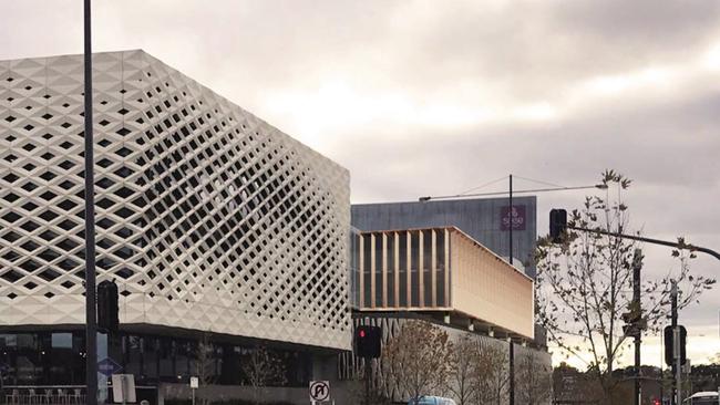 An artist's impression of Maroondah Council's new offices at Ringwood Town Square — a bronze building between REALM and Sage Hotel. Picture: Supplied.