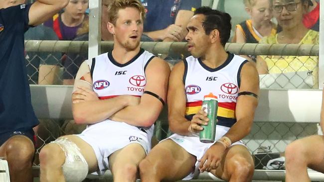 Rory Sloane of the Crows sits on the bench injured next to Eddie Betts of the Crows during the round 11 match at TIO Stadium in Darwin. Picture: Scott Barbour/Getty Images