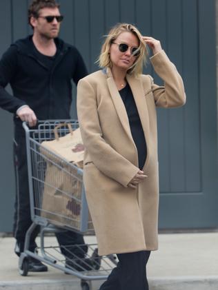 Lara Bingle shows off baby bump with Sam Worthington | news.com.au ...