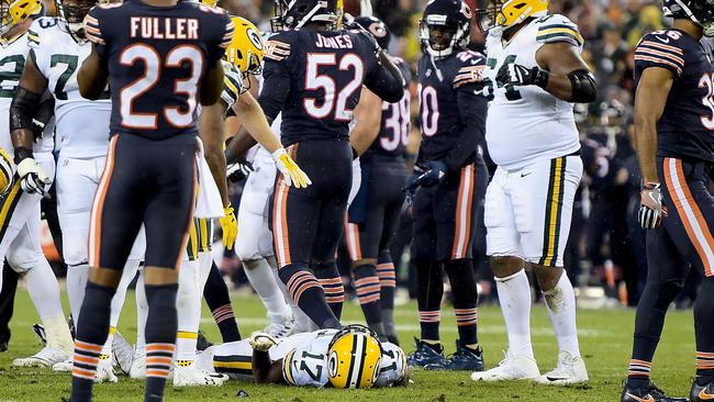 Davante Adams lays on the field after being injured in the third quarter against the Chicago Bears.