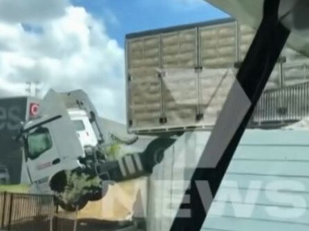 Truck over a wall at the Big Fish Bunnings complex on Pumicestone Road. Picture: 7News