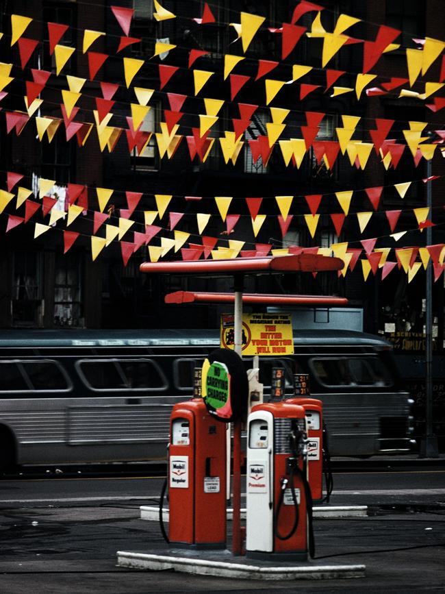 Pennants decorating a petrol station in New York City, 1962