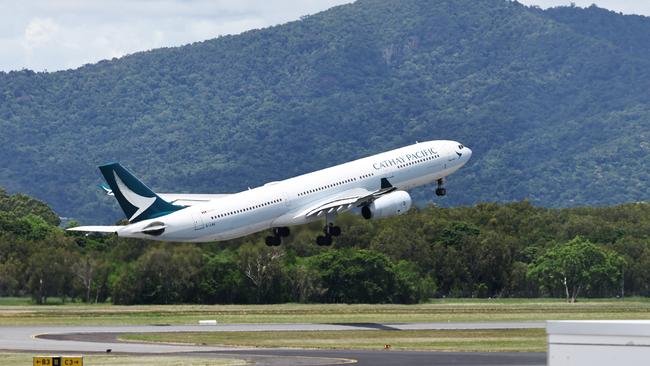 A Cathay Pacific Airbus A330 jet plane takes off from Cairns International Airport on a flight bound for Hong Kong. Picture: Brendan Radke