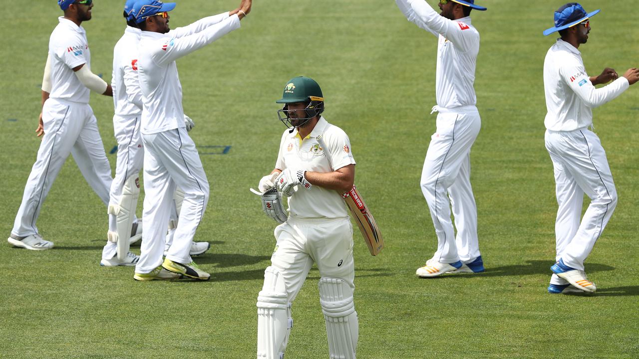 Sri Lanka players celebrate the wicket of Joe Burns. Photo: Robert Cianflone/Getty Images.