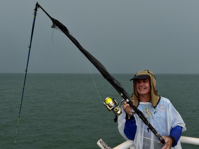 Thunder storm dumps rain and lightning on Townsville. Eugene Dryden had a lucky escape when lightning struck his fishing rod at the rock pool. Picture: Evan Morgan