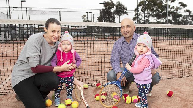 Cara and Lynton Joseph with their 18 month old twins Heidi and Monique. Picture: Ellen Smith