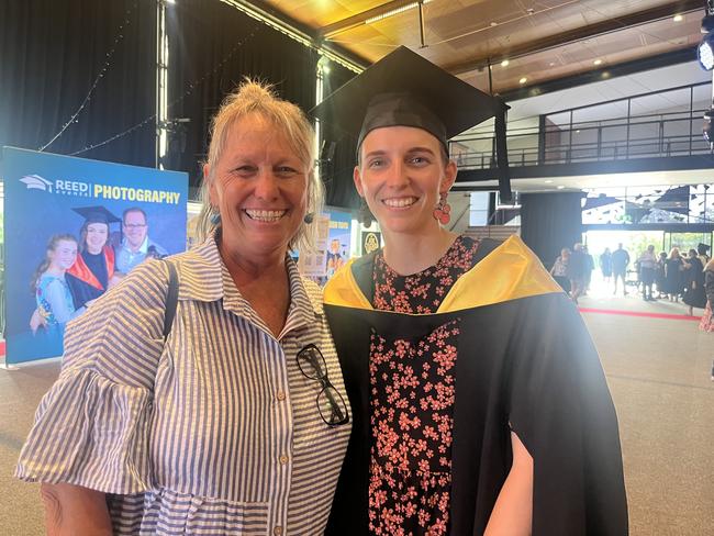 Graduates from the University of the Sunshine Coast's Fraser Coast campus celebrating at the Brolga Theatre.