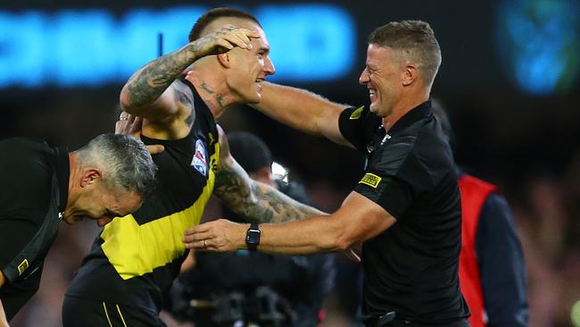 Damien Hardwick and Dustin Martin embrace after the Norm Smith medallist’s masterclass.