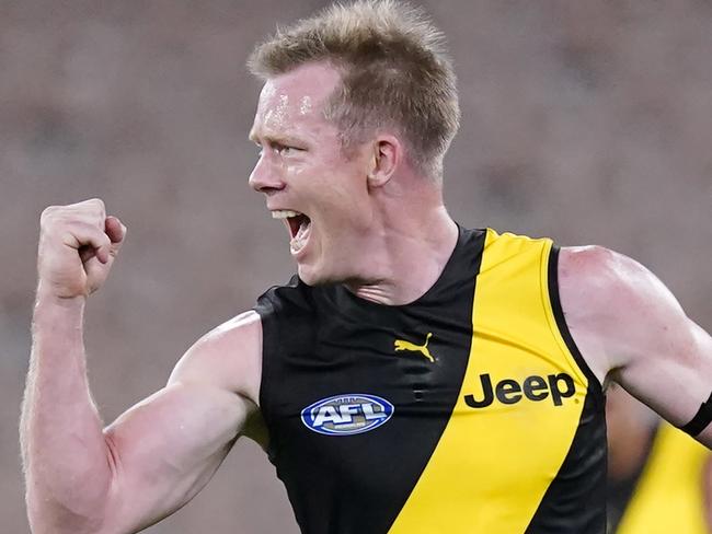 Jack Riewoldt of the Tigers celebrates a goal during the Round 1 AFL match between Richmond and Carlton at the MCG in Melbourne, Thursday, March 19, 2020. (AAP Image/Michael Dodge) NO ARCHIVING, EDITORIAL USE ONLY