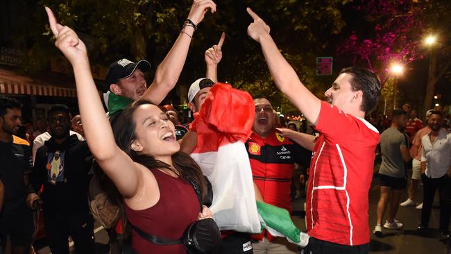 Fans celebrate in Carlton. Picture: Josie Hayden