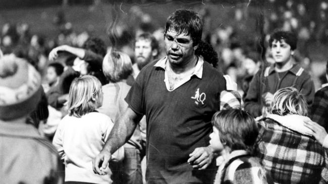 Arthur Beetson is surrounded by fans as he walks off the field at the end of the first Queensland v NSW State of Origin match, played at Lang Park in Brisbane on July 8, 1980. Queensland won 20-10 – and character triumphed. Picture: News Corp