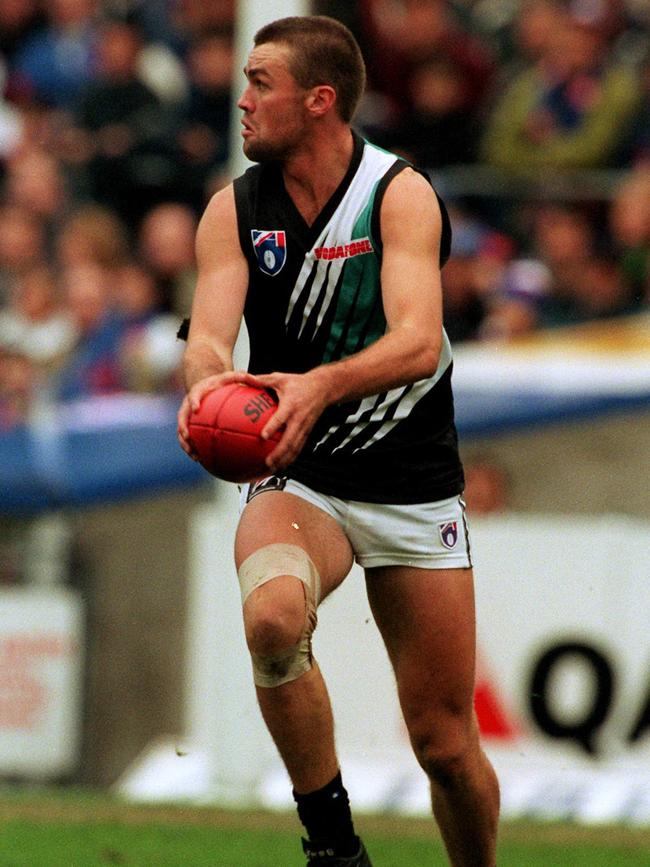 The Power’s Adam Heuskes runs the ball out of defence in the comeback win against the Western Bulldogs.