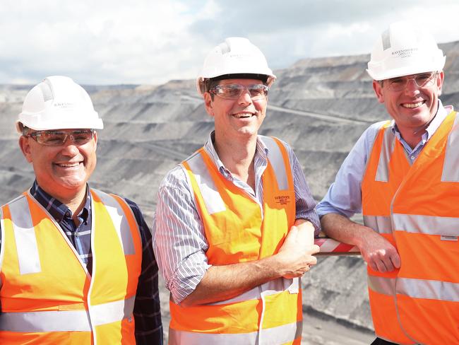 NEWCASTLE, AUSTRALIA - NewsWire Photos - April 8, 2021. L-R Deputy Premier John Barilaro, newly nominated Nationals candidate for the Upper Hunter, D avid Layzell  and  Treasurer Dominic Perrottet at Glencore's Ravensworth coal mine north west of Singleton. Picture: NCA NewsWire / Peter Lorimer.