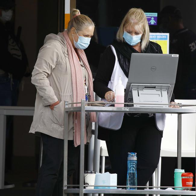 Day 2 in lockdown. Members of the public line up to get tested for Covid at the Albert Waterways Community centre. Picture: Tertius Pickard