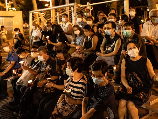 Thousands gathered for the annual memorial vigil in Victoria Park to mark the 1989 Tiananmen Square Massacre despite a police ban. Picture: Anthony Kwan/Getty Images