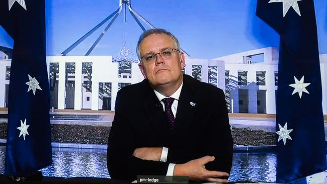 Scott Morrison takes part in question time from quarantine in Canberra on Monday. Picture: Martin Ollman