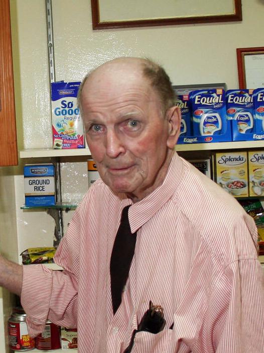 Murder victim Frank Newbery photographed in his store. Picture: Ron Morrison.