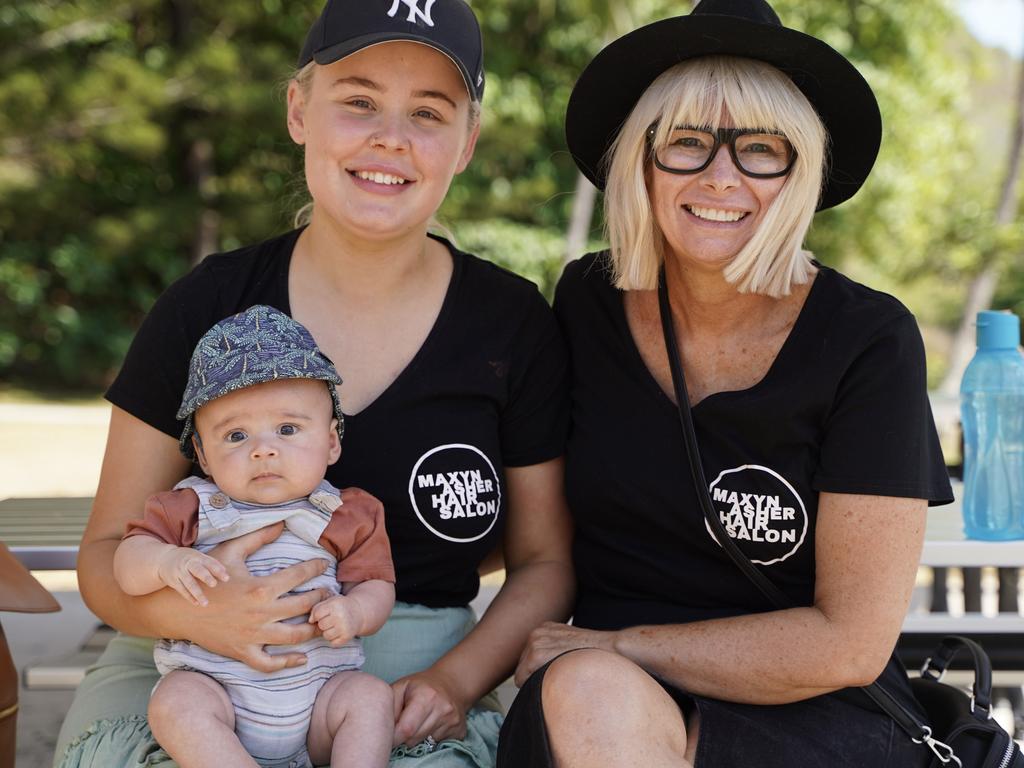 Maxyn Asher Hair Salon co-owners Hannah Graham, with son Wyatt, 3 months, and Nicole Donnell at the Reclaim the Beach event to support their co-worker Kaitlin Jones after she was allegedly stabbed on Blacks Beach. Picture: Heidi Petith