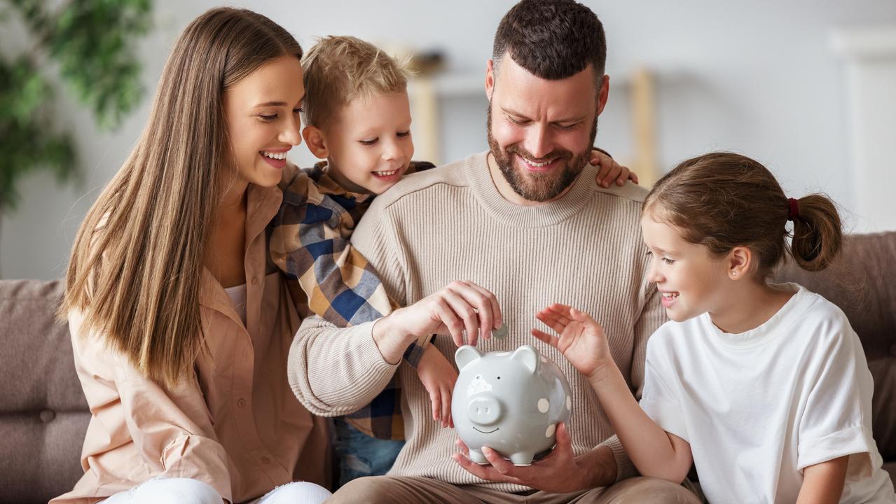 Happy family saving money together