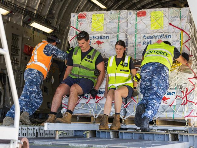 Friday - Stores are loaded onto a Royal Australian Air Force C-17A Globemaster III bound for Vanuatu, RAAF Base Amberley, Queensland. *** Local Caption *** Defence supports the Whole of Australian Government's response to the Vanuatu government's request for assistance following an earthquake which struck Port Vila. Defence mobilised air assets at RAAF Bases Amberley and Fairbairn, including a C-17A Globemaster III and C-130J Hercules, to support the deployment of Australia's response teams. Picture - ADF