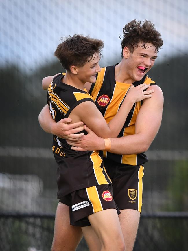 Padua’s Darby Breeden is congratulated by a teammate earlier in the season.