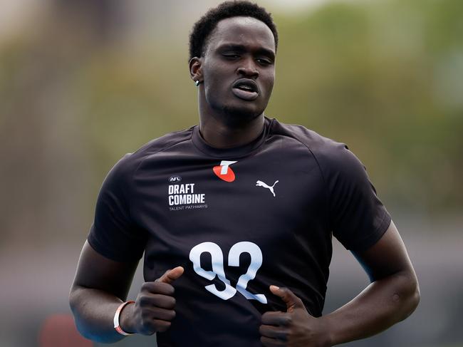 MELBOURNE, AUSTRALIA - OCTOBER 06: Ajang Kuol Mun (Victoria - Geelong Cats (VFL)) competes in the 2km time trial during the Telstra AFL State Draft Combine at MSAC on October 06, 2024 in Melbourne, Australia. (Photo by Dylan Burns/AFL Photos via Getty Images)