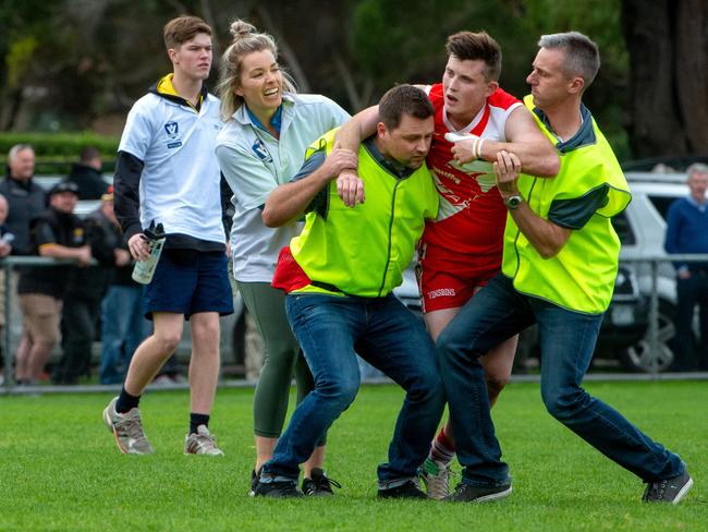 Sorrento's Jack Grants gets helped from the field. Picture: Jay Town