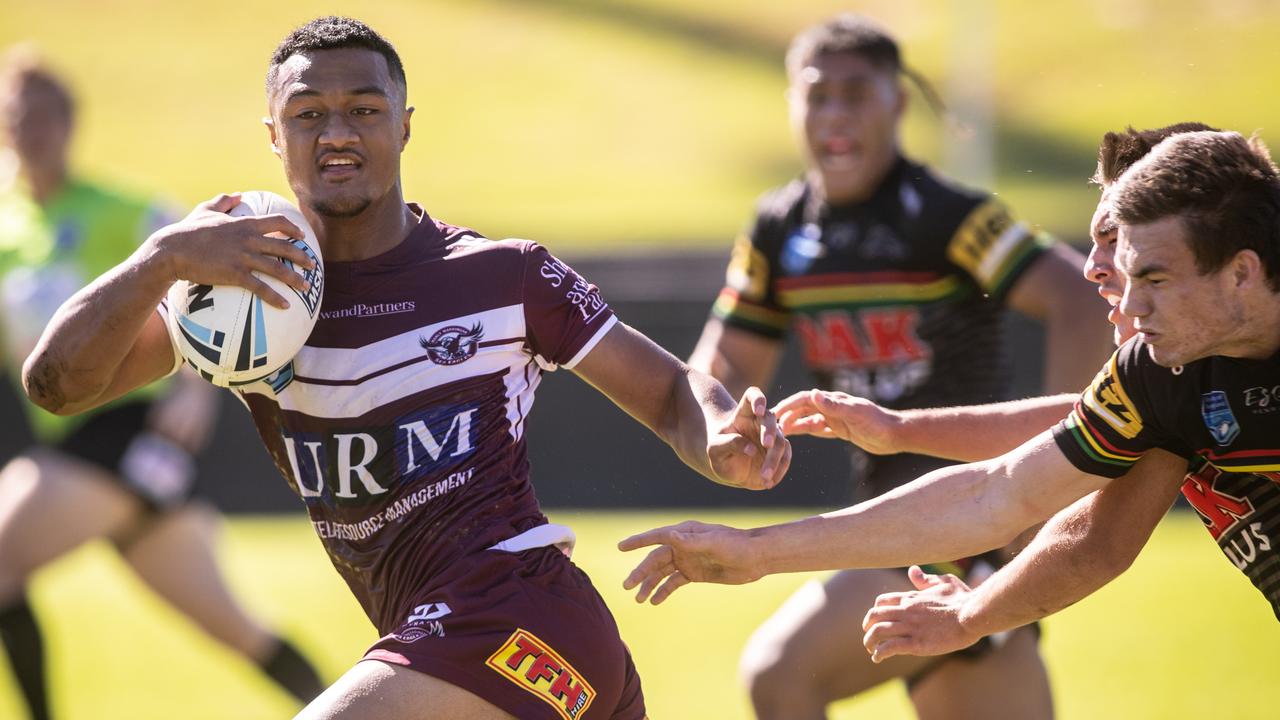 Action photographs from the Harold Matthews game between Manly v Penrith, at Brookvale Oval on 27th March 2021. Picture shows Manly's outstanding Latu Fainu making another break. (Pictures by Julian Andrews).
