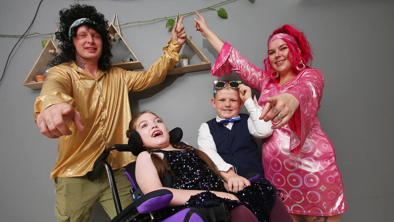 Wade and Chloe Rees with Narkiah and Memphis Bishop. The family is fundraising for a wheelchair accessible car. Picture: Alan Barber