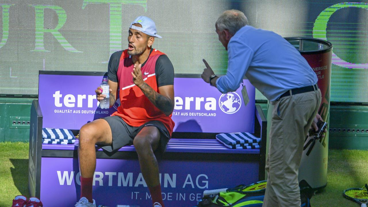 Nick Kyrgios (L) argues with ATP Supervisor Hans-Juergen Ochs in his match against Stefanos Tsitsipas. Picture: Thomas F. Starke/Getty Images