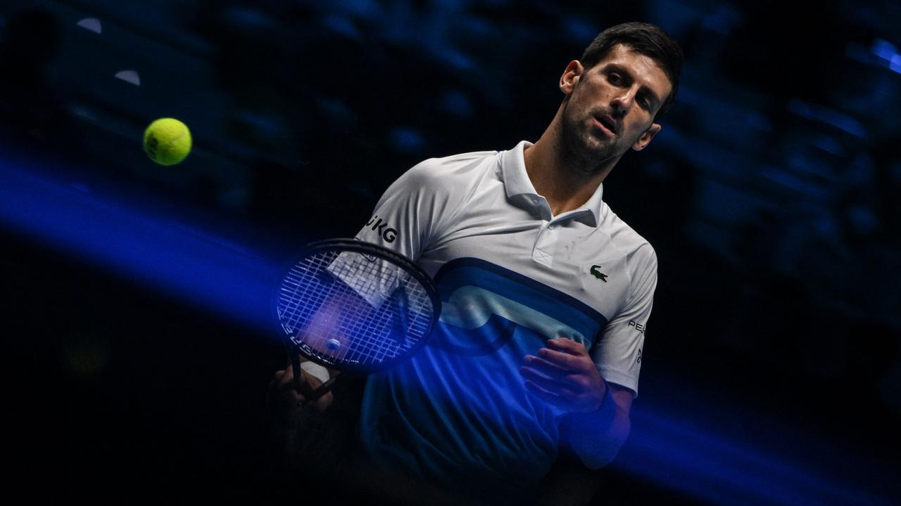 Serbia's Novak Djokovic reacts during his first round singles match of the ATP Finals against Britain's Cameron Norrie at the Pala Alpitour venue in Turin on November 19, 2021. (Photo by Marco Bertorello / AFP)