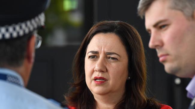 Queensland Premier Annastacia Palaszczuk (centre) with Queensland Police Commissioner Ian Stewart (left) and Queensland Police Minister Mark Ryan. Pictture: AAP