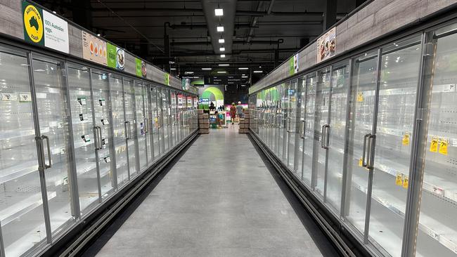 Stripped shelves at the Byron Bay Woolworths. Picture: Matthew Condon