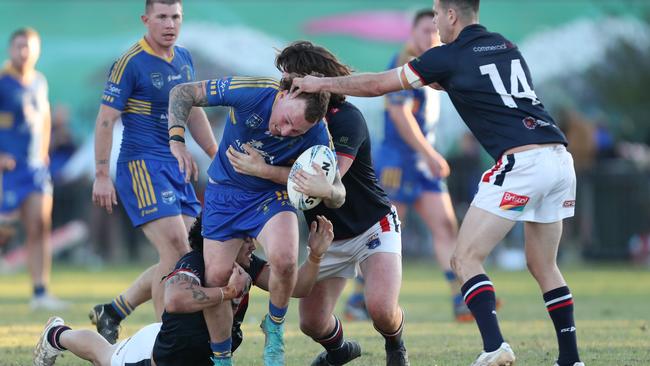 Jayden Jones carting the ball forward for Toukley. Picture: Sue Graham