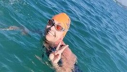 Ocean swimmer Gaby Donnelly, 45, is a coach at the Cairns Mudcrabs and said "you always feel better after having a swim." Picture: Supplied