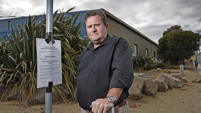 Bellerive resident Dean Young out the front of the proposed site for the Dan Murphys bottle shop on Percy St, which he and some other residents are oppose to. Picture: ZAK SIMMONDS