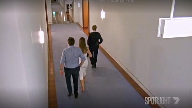 Bruce Lehrmann and Brittany Higgins being escorted to an office by a security guard. Picture: Seven Picture – Seven News Spotlight