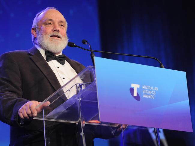 Proud ... Bill Lark, of Lark Distillery, accepts his award for Best Small Business in Australia at the Telstra Business Awards in Melbourne. Picture: Supplied