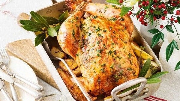 Roast lemon and mixed herb turkey.