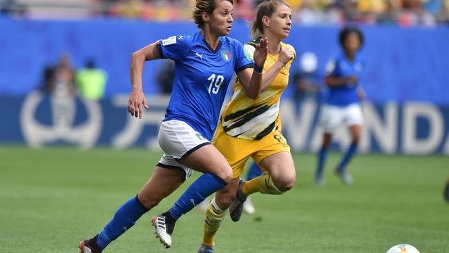 Matildas midfielder Elise Kellond-Knight, right, competes for the ball against Valentina Giacinti of Italy in the World Cup match on Sunday. Picture: Getty Images