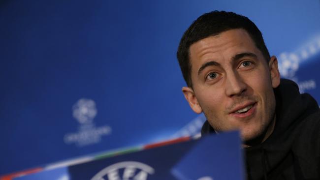 Chelsea's Eden Hazard listens to journalists' questions