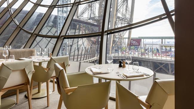 Some tables at Madame Brasserie look inwards at the structure.