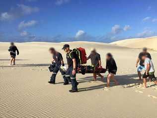 A woman was airlifted to Bundaberg Base Hospital after a sand board incident on Fraser Island. Picture: Courtesy RACQ LifeFlight Rescue