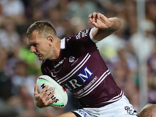 SYDNEY, AUSTRALIA - MARCH 08: Tom Trbojevic of the Sea Eagles makes a break during the round one NRL match between Manly Sea Eagles and North Queensland Cowboys at 4 Pines Park, on March 08, 2025, in Sydney, Australia. (Photo by Cameron Spencer/Getty Images)