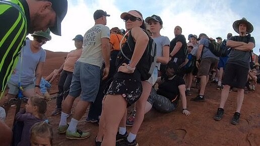 A number of people have been allowed on to Uluru as winds died down.