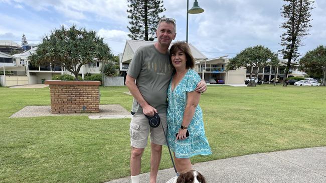 Sean and Lisa Armstrong with their dog Dillon celebrating Christmas at La Balsa Park.