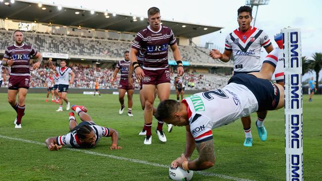 Young guns unite! Sydney Roosters winger Matt Ikuvalu scores a fine try out wide. Picture: Getty