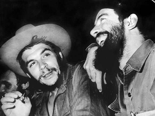 Guevara wears Cuban revolutionary Commander Camilo Cienfuegos' hat after he exchanged it for his beret during a rally in Havana in 1959. Picture: AFP