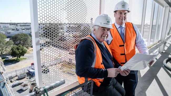 Former Playford chief executive with Mal Hemmerling and mayor Glenn Docherty in a carpark built by the council at Elizabeth. Picture: Morgan Sette/AAP